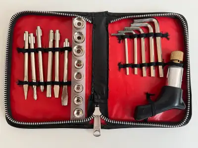 20-piece tool set, including an assortment of screwdriver heads, sockets, and Allen keys all in a co...