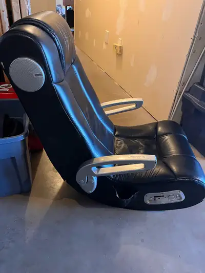 Older model xRocker leatherette gaming chair. Still works great, speakers and sub-woofer sound great...