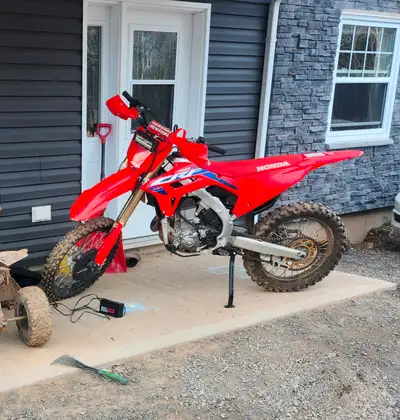 Basically brand new 2024 crf450r. added aftermarket kick stand and handguards. This bike was barely...