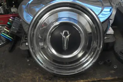 Poverty caps i have 6 driver quality , also have a 1967 chevelle BB HOOD after market $700 must pick...