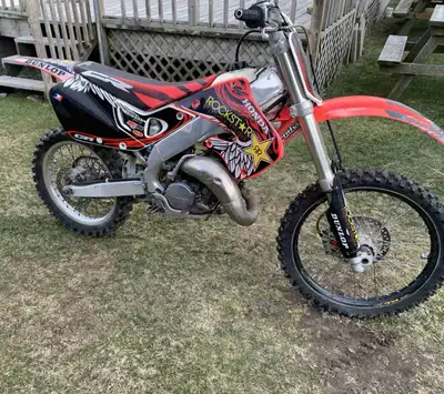 Clean 1999 cr 125 runs good Bike is in awesome shape well taken care of 3500$firm