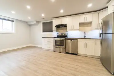 For August 1st, 2026 This fully up-to-code legal duplex features an incredibly bright lower-level li...