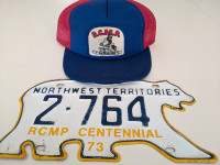 RCMP Centennial NWT License Plate and Hay River RCMP ball cap