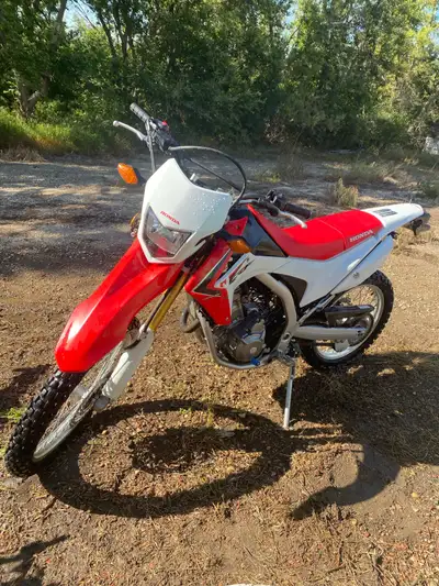 It’s a 2014 crf250l Honda it runs great for the year never had a problem no kick start new battery s...