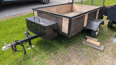 I have a used 4'x6' trailer. Has a storage box up front and a wind down jack. Gate drops to become r...