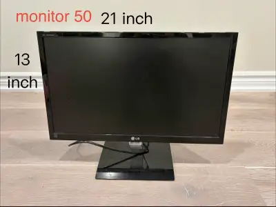 2 monitors and a TV, View more