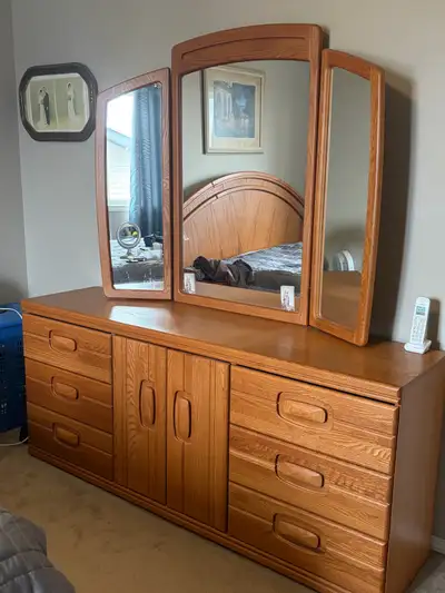 Headboard with nightstands that adjust to fit double or queen bed frame. Measures 100" wide ( bed fr...