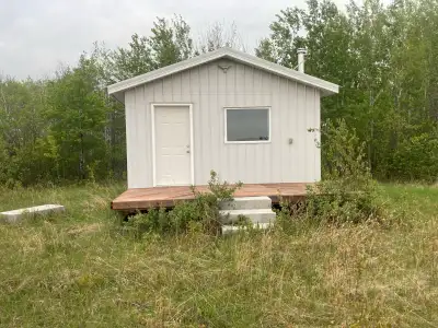 Cabin for sale. On heavy steel pipe frame that makes it very easy to skid anywhere or load onto semi...