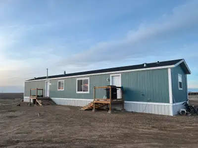 1997 Mobile Home 16x76 New exterior paint, doors, and roof. Flooring, light fixtures, hot water tank...
