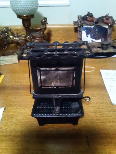 Have a nice antique from Central oil and gas stove co. Sad Iron heater from Gardner Mass. USA. It is...