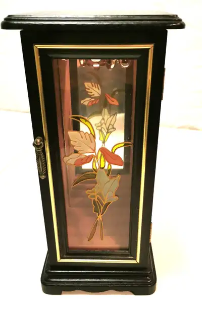 A sleek, professional organizational solution for a dresser or vanity, this Mele & Co. upright jewel...