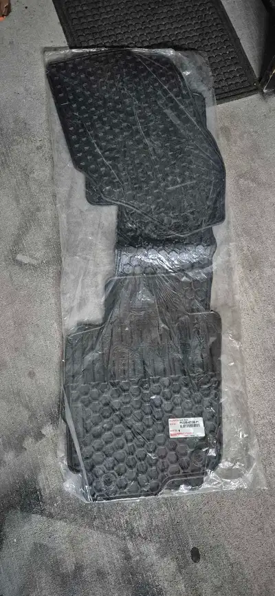 Winter All season rubber mats front and rear in brand new condition. Mats front and rear in sealed b...