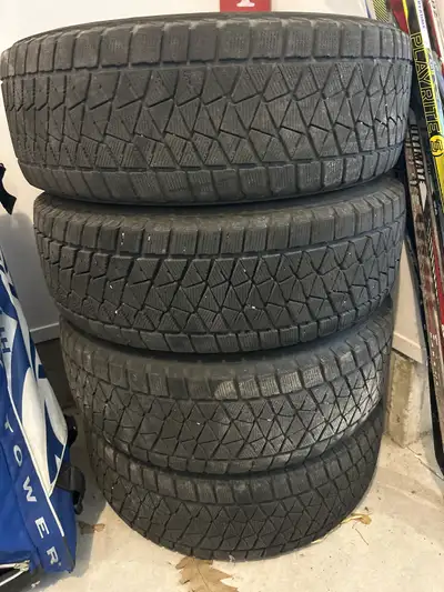 Used Bridgestone winter tires on rims. Formally used for a couple of seasons on a Chrysler Pacifica...