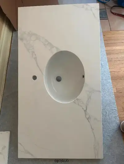 New Quartz Countertop! With oval under mount sink. Single hole faucet. 41 1/4” x 22 1/2” $200