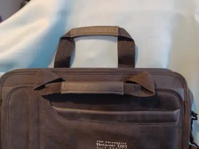 Black laptop bag with shoulder carrying strap , View more