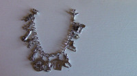 REDUCED: Sterling Silver Charm Bracelet with 15 Charms
