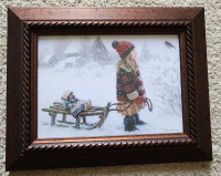 Item 18: A print of a young girl pulling a sledge
