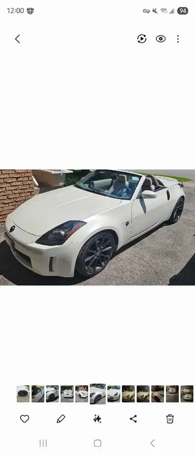 This 2005 Nissan 350Z Roadster features a powerful 3.5L V6 engine and a stylish convertible soft top...