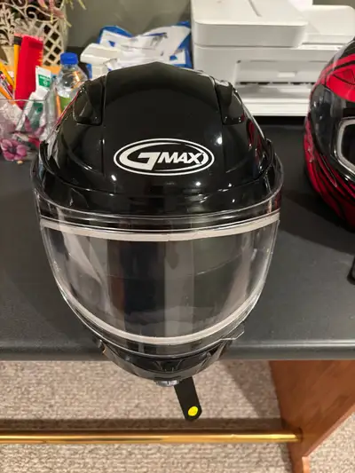 I'm selling a couple of GMAX snowmobile helmets that are in excellent condition. One is black and th...
