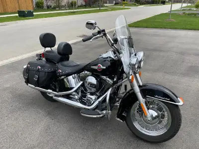 Includes OEM add-ons: engine guard bars, highway pegs, heated grips, 12v handlebar-mounted power soc...