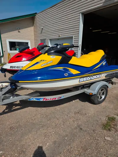 2006 GTISE 3 seater, Blue & Yellow 150hp With 131 hours 2007 wake edition with ski pole. Red & white...