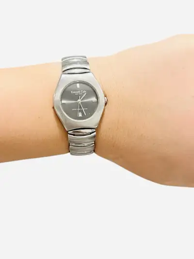 Add a touch of modern designer style to your wardrobe with this Kenneth Cole New York silver-tone wr...