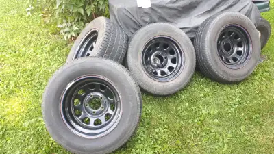 2 x 215/70R15 and 2 x 255/60R15 chev 5 bolt, 4 and three quarter inch hole spaces, will fit chev S10...