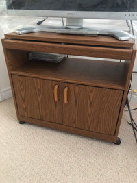 Wood grain wheeled TV stand with doors