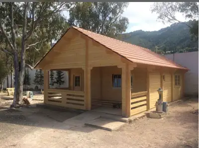 Discover the perfect escape with our cabin kits, offering a cozy retreat with a charming porch, stur...