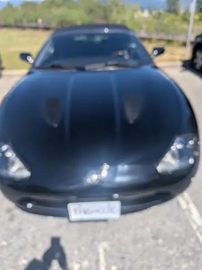 **Price: $25,900 CAD** For sale is a **2003 Jaguar XKR 4.2L Supercharged Coupe** with only **80,063...