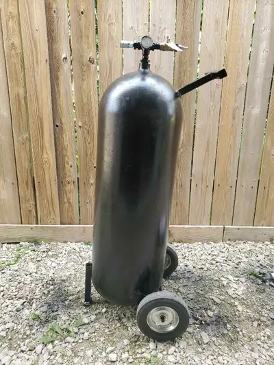 Up to 200 psi air tank on wheels. Can be used standing up or laying down. $280 obo