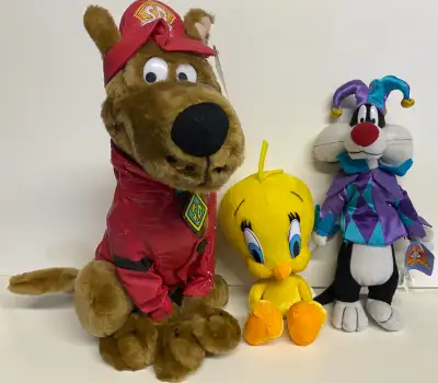 Vintage 1990’s Scooby-Doo, Tweety Bird and Sylvester the Cat plush toy collectibles with tags attach...