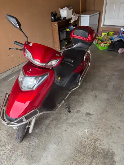 Bought in 2022 but never used. Brand New Foken 50cc scooter with storage in back and under seat. Pro...