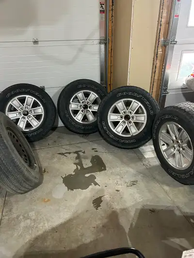 4 tires plus 1 spare tire. 5 in total Spare tire never used from Brand new 4 Tires do have wear They...