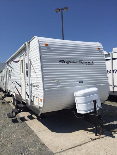 This trailer has AC/Microwave/Awning/ Stereo/Duel 20lb propane / Dual Batteries. One permanent full...