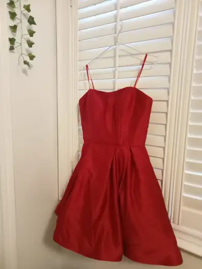 Brand new prom dress from Hudson Bay. Size: 12 Colour: Red If anybody's interested, please send an e...