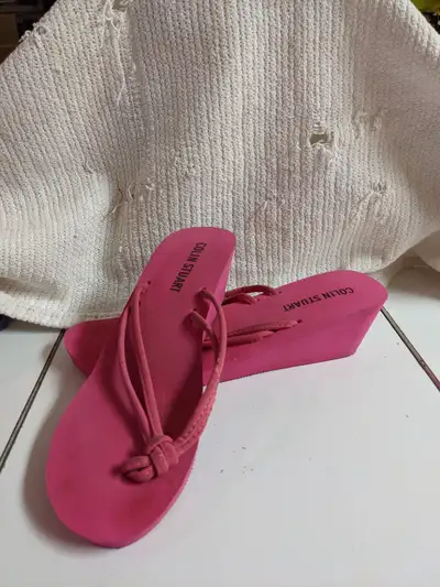 Bright pink Colin Stuart Wedge flip flop. 2 inch heel. Very comfortable and very cute. Barely worn....