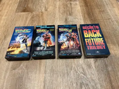 Back to the Future Trilogy and the Secrets of the Trilogy. Secrets is NEW, parts 1,2,3 all in mint c...