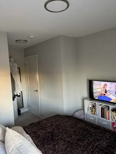 A private bedroom with a bath is available for a clean and quiet female tenant in a brand new condo...