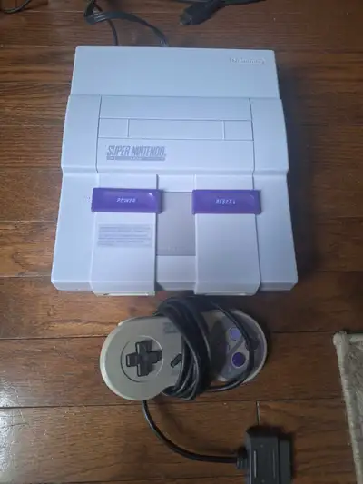Selling a super nintendo snes console with all cables and 1 controller. Asking $150.