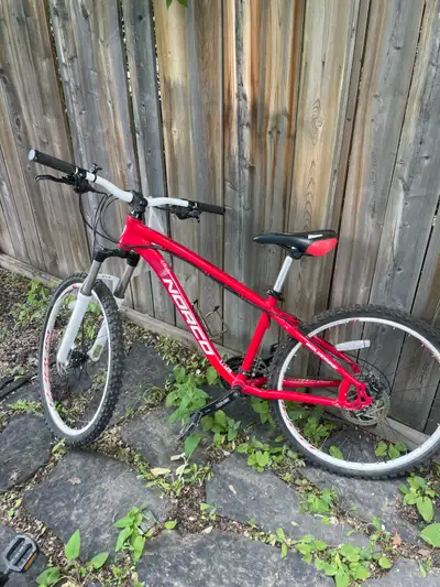 15’’ Red Norco Wolverine mountain bike in excellent condition, with shimano shifters and 2.2 tires.