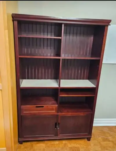 Lots of storage with open shelves, a hanging wine glass rack, one drawer, and a lower cabinet. Dimen...