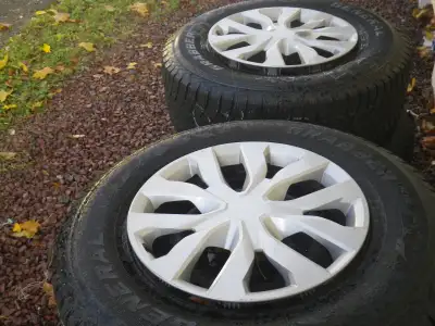 Studded winter tires, rims and hubcaps. Were on Toyota FJ Cruiser