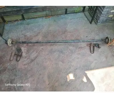 80 inches from side to side With Hardware Awel is 67 1/2 inches on the inside where the trailer supp...