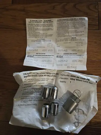 Mazda Wheel Lock Kit. From a Mazdaspeed 3. Used, but like new.