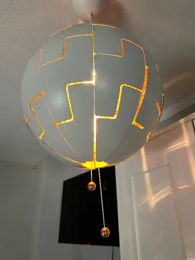 Changing room decor - IKEA pendant lamp, white/copper color, 35 cm (14"). Retails for $79.99