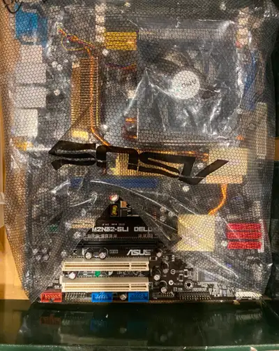ASUS Motherboard ASUS M2N32-SLI Deluxe $40 OBO, View more