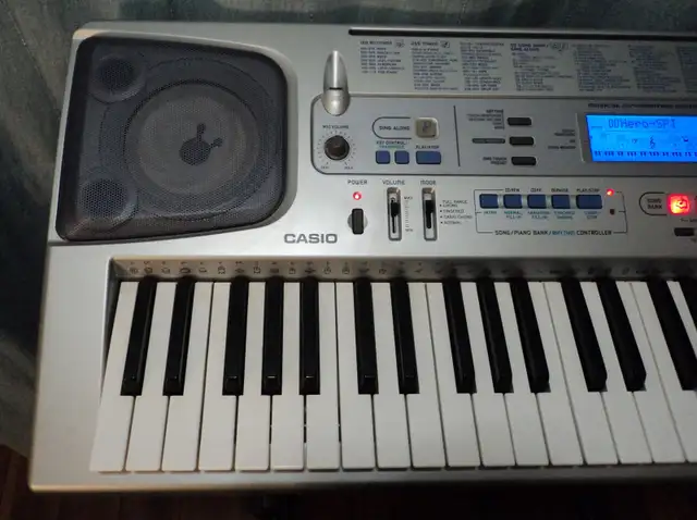 Casio CTK-591 Full-Size 61 Key Keyboard with Song Memory Record64728172316803121