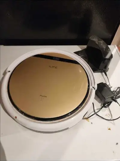 This iLife robot vacuum is perfect for keeping your floors clean effortlessly, it is in used conditi...