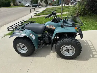 One owner Yamaha 350 4 X 4 Big Bear Quad. Comes with A2000 Warn winch. 868 original km. Carb needs s...